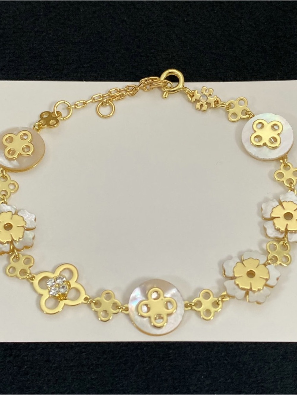 Tory Burch Gold and White Floral Shell Link Bracelet